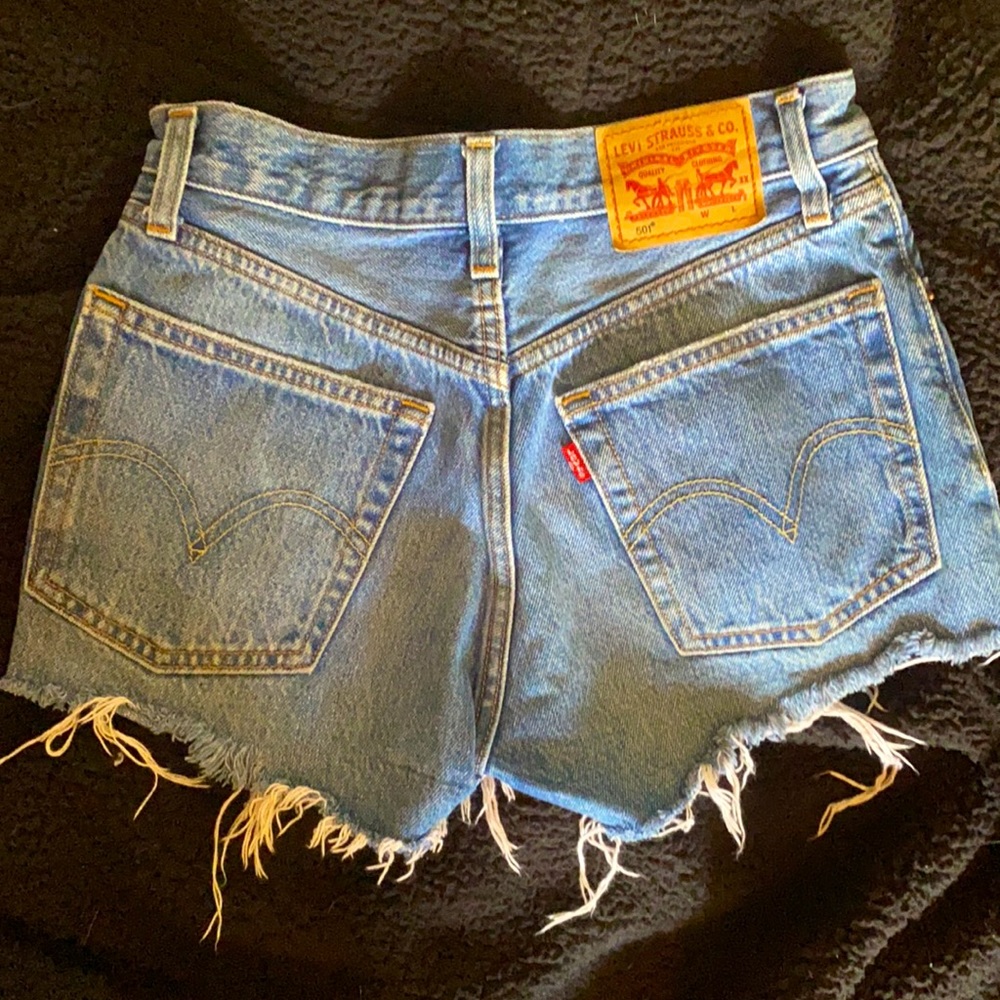 Levi 501 shorts. Size 24. Medium washed.